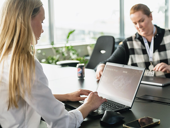 Intuvio employees in a meeting